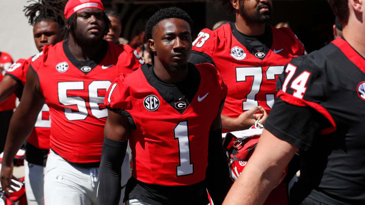 Georgia running back Trevor Etienne (1) arrives with the team before the start of the G-Day spring football game in Athens, Ga., on Saturday, April 13, 2024.