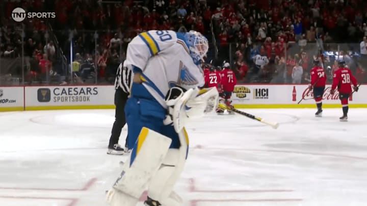 Jordan Binnington tried to swipe the puck from Alex Ovechkin’s 900th goal