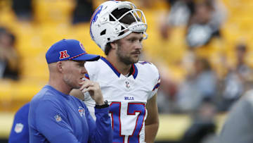 Buffalo Bills head coach Sean McDermott and QB Josh Allen (17) talk on the field before the game against the Steelers.