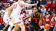 Sam Houston State Bearkats guard Lamar Wilkerson (3) dribbles the ball while Indiana Hoosiers forward Luke Goode (10) defends in the second half at Simon Skjodt Assembly Hall. Mandatory Credit: Trevor Ruszkowski-Imagn Images