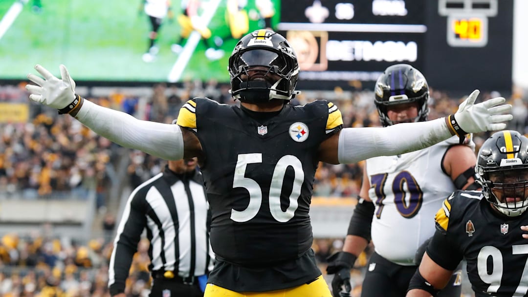 Nov 17, 2024; Pittsburgh, Pennsylvania, USA;  Pittsburgh Steelers linebacker Elandon Roberts (50) reacts after stopping the Baltimore Ravens on a two point conversion attempt during the fourth quarter at Acrisure Stadium. Mandatory Credit: Charles LeClaire-Imagn Images