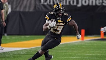 Nov 15, 2025; Columbia, Missouri, USA; Missouri Tigers running back Ahmad Hardy (29) runs the ball against the Mississippi State Bulldogs during the second half of the game at Faurot Field at Memorial Stadium. Mandatory Credit: Denny Medley-Imagn Images