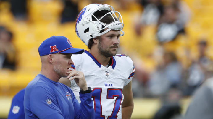 Aug 17, 2024; Pittsburgh, Pennsylvania, USA;  Buffalo Bills head coach Sean McDermott (left) and quarterback Josh Allen (17) talk on the field before the game against the Pittsburgh Steelers at Acrisure Stadium. Mandatory Credit: Charles LeClaire-USA TODAY Sports