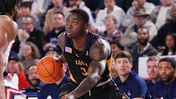 Jan 2, 2024; Boca Raton, Florida, USA; East Carolina Pirates guard RJ Felton (3) dribbles the ball against the Florida Atlantic Owls during the first half at Eleanor R. Baldwin Arena. Mandatory Credit: Rich Storry-Imagn Images