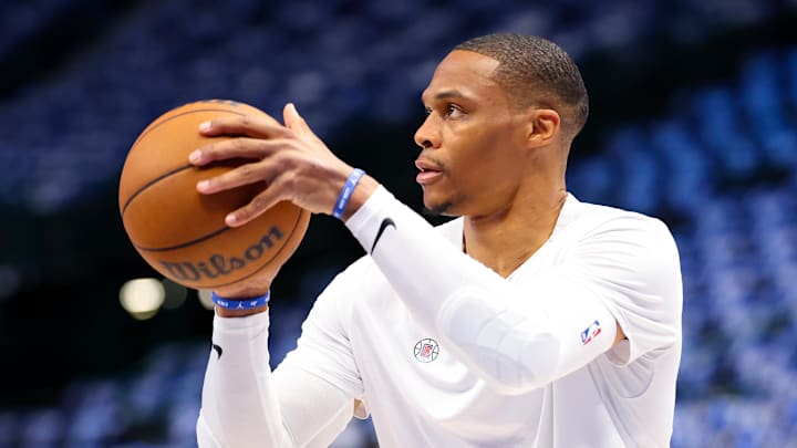 Former Los Angeles Clippers guard Russell Westbrook warms up before a game.