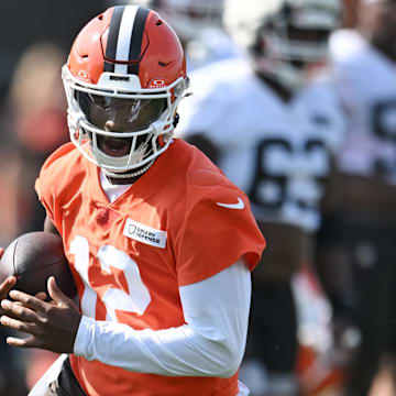 Cleveland Browns quarterback Shedeur Sanders (12) scrambles during training camp at CrossCountry Mortgage Campus.
