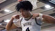 Jan 4, 2025; Gilbert, AZ, USA; Notre Dame High School (CA) forward Tyran Stokes (4) flexes as he celebrates a shot against Sandra Day O'Connor (AZ) during the Hoophall West High School Invitational at Highland High School. Mandatory Credit: Mark J. Rebilas-Imagn Images