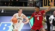 Purdue Boilermakers guard Fletcher Loyer (2) drives past Rutgers Scarlet Knights guard Ace Bailey (4) Tuesday, March 4, 2025, during the NCAA men’s basketball game at Mackey Arena in West Lafayette, Ind.