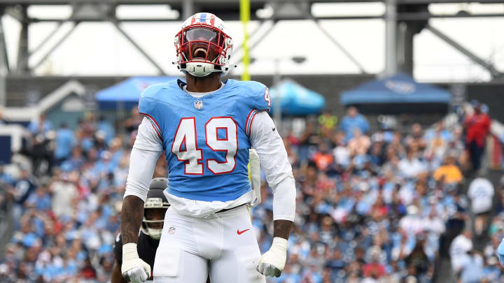 Oct 29, 2023; Nashville, Tennessee, USA; Tennessee Titans linebacker Arden Key (49) celebrates after a defensive stop during the first half against the Atlanta Falcons at Nissan Stadium. Mandatory Credit: Christopher Hanewinckel-USA TODAY Sports