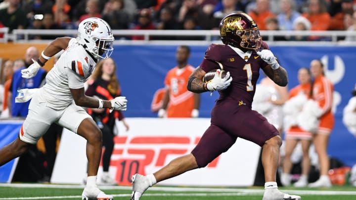 Dec 26, 2023; Detroit, MI, USA;  Minnesota Golden Gophers running back Darius Taylor (1) runs for a touchdown against the Bowling Green Falcons in the fourth quarter at Ford Field.