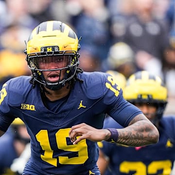 Team Blue quarterback Bryce Underwood warms up before the first half of the spring game at Michigan Stadium in Ann Arbor on Saturday, April 19, 2025.