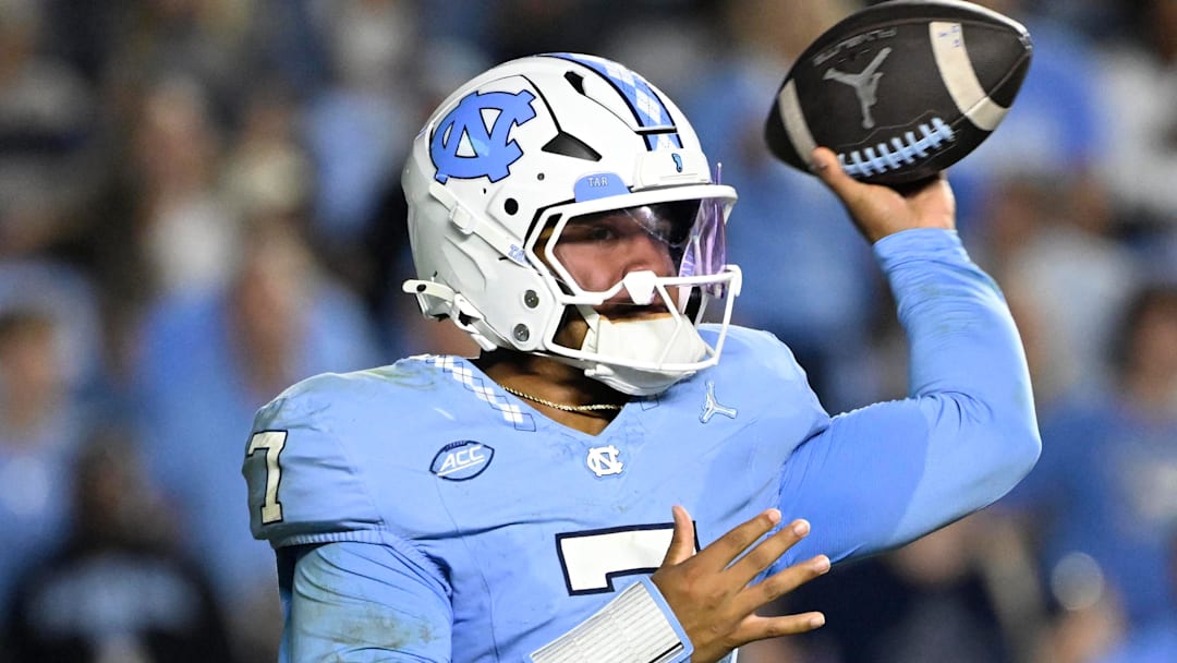 Nov 8, 2025; Chapel Hill, North Carolina, USA; North Carolina Tar Heels quarterback Gio Lopez (7) looks to pass in the second quarter at Kenan Stadium. Mandatory Credit: Bob Donnan-Imagn Images