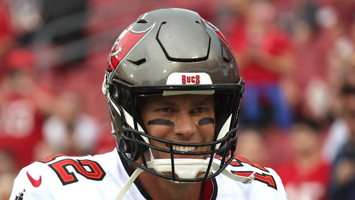 Jan 1, 2023; Tampa, Florida, USA;  Tampa Bay Buccaneers quarterback Tom Brady (12) warms up against the Carolina Panthers prior to the game at Raymond James Stadium. Mandatory Credit: Kim Klement-Imagn Images