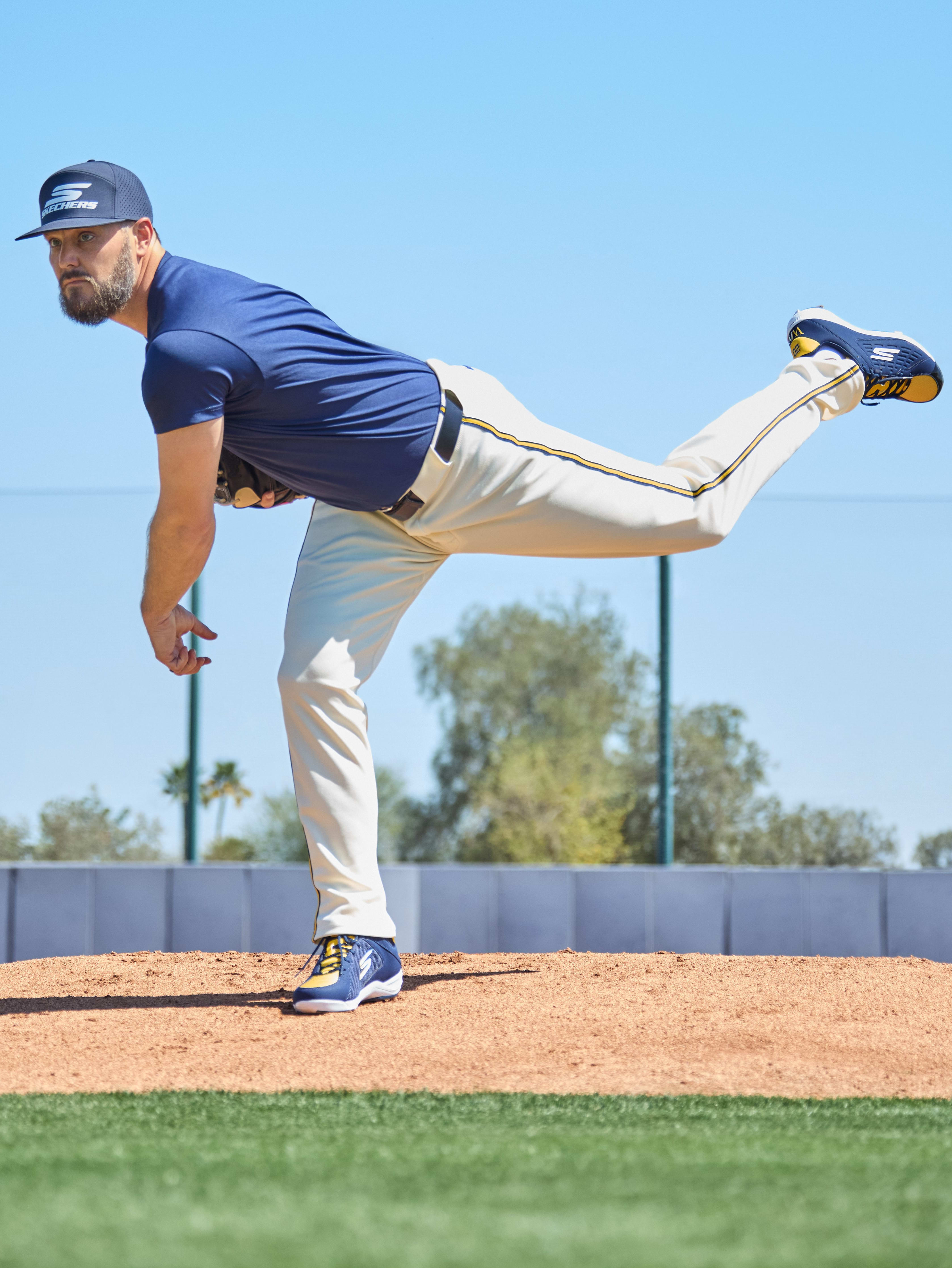 Wade Miley throws a pitch in a Skechers photo shoot.