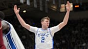 Mar 1, 2025; Durham, North Carolina, USA;  Duke Blue Devils forward Cooper Flagg (2) reacts after scoring against the Florida State Seminoles during the second half at Cameron Indoor Stadium.  Blue Devils won 100-65. Mandatory Credit: Zachary Taft-Imagn Images