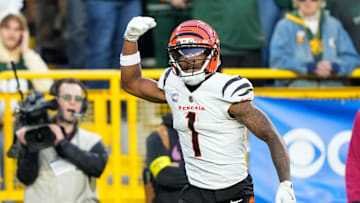 Oct 12, 2025; Green Bay, Wisconsin, USA; Cincinnati Bengals wide receiver Ja'Marr Chase (1) reacts after scoring a touchdown in the fourth quarter against the Green Bay Packers at Lambeau Field. Mandatory Credit: Kayla Wolf-Imagn Images