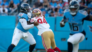 Tennessee Titans offensive tackle JC Latham (55) takes on San Francisco 49ers defensive end Yetur Gross-Matos (94) to give quarterback Will Levis (8) time to throw during their first preseason game of the 2024-25 season at Nissan Stadium.