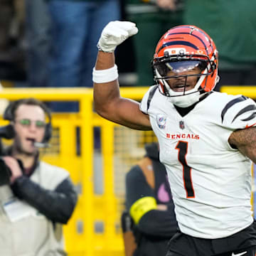 Oct 12, 2025; Green Bay, Wisconsin, USA; Cincinnati Bengals wide receiver Ja'Marr Chase (1) reacts after scoring a touchdown in the fourth quarter against the Green Bay Packers at Lambeau Field. Mandatory Credit: Kayla Wolf-Imagn Images