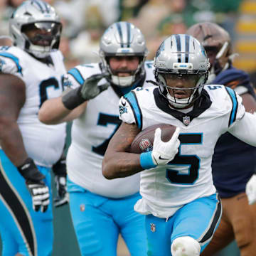 Carolina Panthers running back Rico Dowdle (5) breaks away for a long gain with less than a minute left in the game against the Green Bay Packers during their football game Sunday, November 2, 2025, at Lambeau Field in Green Bay, Wisconsin. Carolina won 16-13.