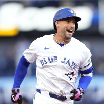 Toronto Blue Jays right fielder George Springer (4) reacts as he runs to third base on his second three-run home run of the game against the New York Yankees during the second inning at Rogers Centre on June 27.