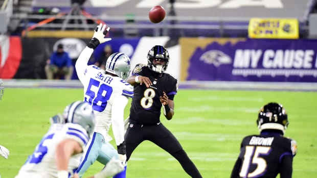 Dec 8, 2020; Baltimore, Maryland, USA; Baltimore Ravens quarterback Lamar Jackson (8) throws a pass