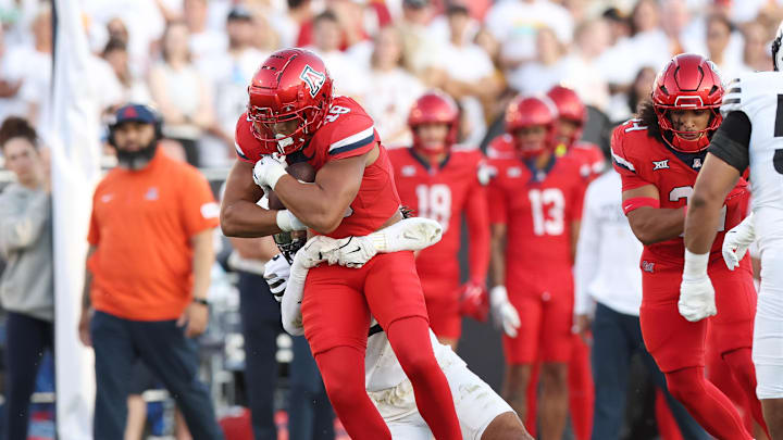 Sep 27, 2025; Ames, Iowa, USA; Arizona Wildcats wide receiver Brandon Phelps (18) catches a pass against the Iowa State Cyclones during the first half at Jack Trice Stadium. Mandatory Credit: Reese Strickland-Imagn Images