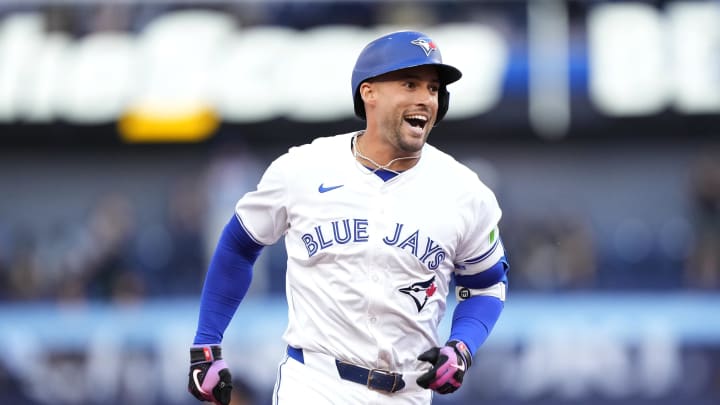 Jun 27, 2024; Toronto, Ontario, CAN; Toronto Blue Jays right fielder George Springer (4) reacts as he runs to third base on his second three-run home run of the game against the New York Yankees during the second inning at Rogers Centre.