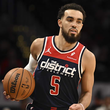 Jan 15, 2024; Washington, District of Columbia, USA; Washington Wizards guard Tyus Jones (5) dibble up the court  during the first half against the Detroit Pistons at Capital One Arena. Mandatory Credit: Tommy Gilligan-Imagn Images