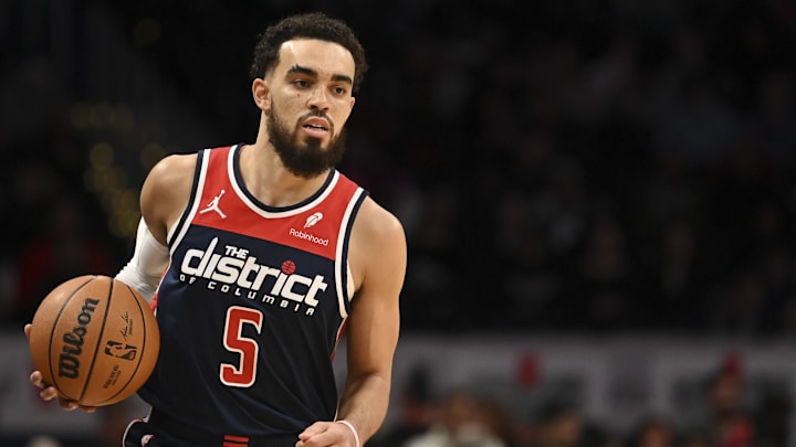 Jan 15, 2024; Washington, District of Columbia, USA; Washington Wizards guard Tyus Jones (5) dibble up the court  during the first half against the Detroit Pistons at Capital One Arena. Mandatory Credit: Tommy Gilligan-Imagn Images