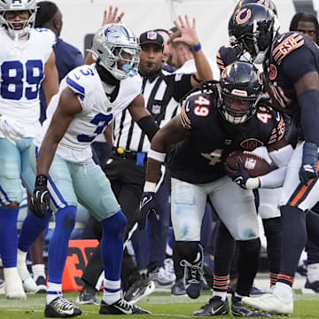 Bears middle linebacker Tremaine Edmunds intercepts a pass in front of Dallas Cowboys wide receiver George Pickens in the fourth quarter.