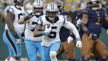 Nov 2, 2025; Green Bay, Wisconsin, USA; Carolina Panthers running back Rico Dowdle (5) breaks away for a long gain with less than a minute left in the game against the Green Bay Packers during their football game at Lambeau Field. Mandatory Credit: Dan Powers-USA TODAY Network via Imagn Images