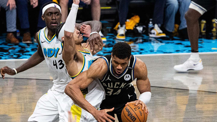 Milwaukee Bucks forward Giannis Antetokounmpo against Indiana Pacers guard Andrew Nembhard during the 2024 NBA Playoffs