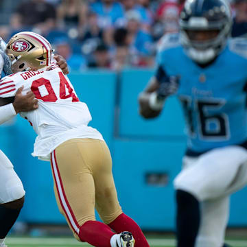 Tennessee Titans offensive tackle JC Latham (55) takes on San Francisco 49ers defensive end Yetur Gross-Matos (94) to give quarterback Will Levis (8) time to throw during their first preseason game of the 2024-25 season at Nissan Stadium Saturday, Aug. 10, 2024.