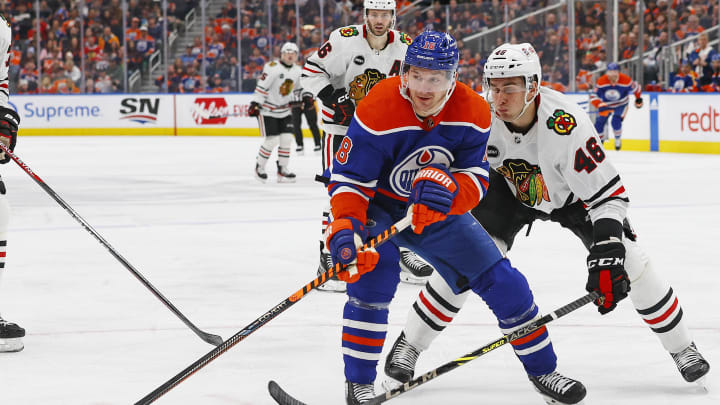 Dec 12, 2023; Edmonton, Alberta, CAN; Edmonton Oilers forward Zach Hyman (18) and Chicago Blackhawks