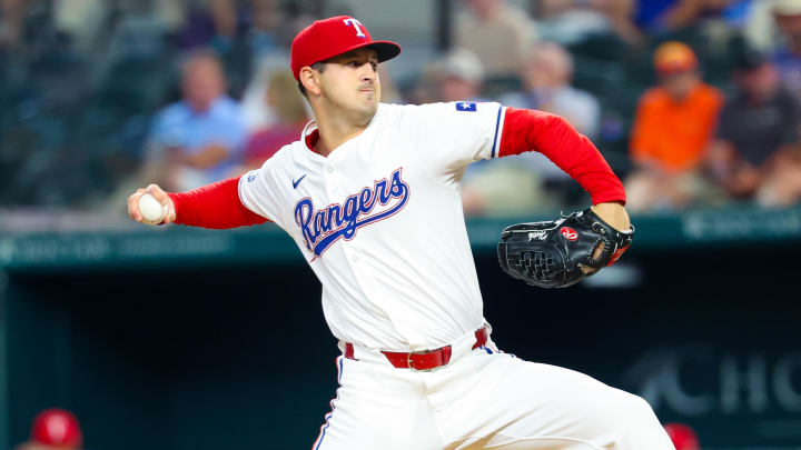 Aug 6, 2024; Arlington, Texas, USA; Texas Rangers starting pitcher Tyler Mahle (51) throws during the third inning against the Houston Astros at Globe Life Field. 