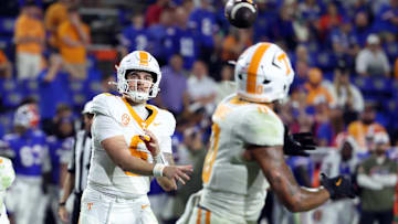Nov 22, 2025; Gainesville, Florida, USA; Tennessee Volunteers quarterback Joey Aguilar (6) throws the ball to tight end Ethan Davis (0) during the second half at Ben Hill Griffin Stadium. Mandatory Credit: Kim Klement Neitzel-Imagn Images