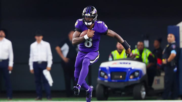 Sep 22, 2024; Arlington, Texas, USA; Baltimore Ravens quarterback Lamar Jackson (8) runs with the ball during the game against the Dallas Cowboys at AT&T Stadium. Mandatory Credit: Kevin Jairaj-Imagn Images