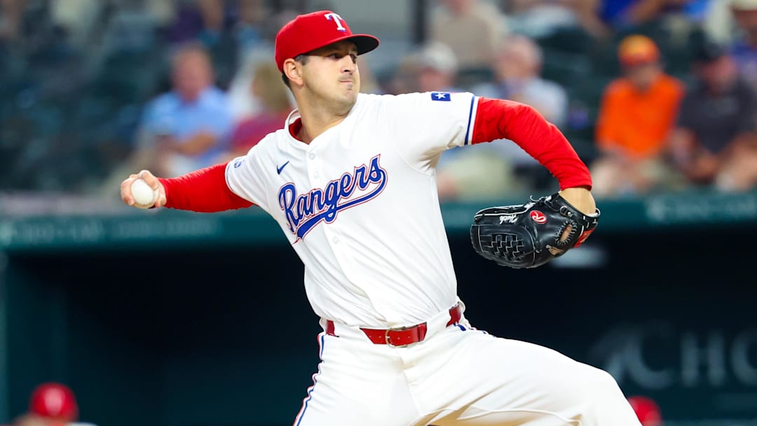 Aug 6, 2024; Arlington, Texas, USA; Texas Rangers starting pitcher Tyler Mahle (51) throws during the third inning against the Houston Astros at Globe Life Field. 