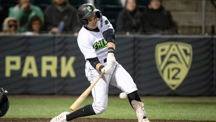 Emeralds infielder Quinn McDaniel hits a single as the Eugene Emeralds host the Tri-City Dust Devils in the season opener Friday, April 5, 2024, at PK Park in Eugene, Ore.