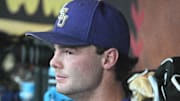 LSU pitcher Kade Anderson sits in the dugout during an NCAA College World Series game against Coastal Carolina on June 21 at Charles Schwab Field.