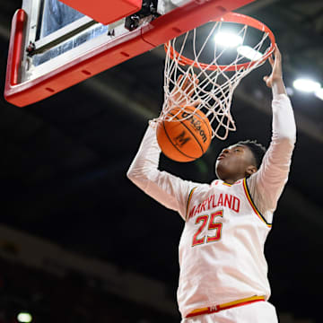 Mar 8, 2025; College Park, Maryland, USA; Maryland Terrapins center Derik Queen (25) dunks the ball during the second half against the Northwestern Wildcats at Xfinity Center. Mandatory Credit: Reggie Hildred-Imagn Images