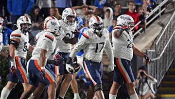 Nov 15, 2025; Durham, North Carolina, USA;  Virginia Cavaliers defensive end Mitchell Melton (17) reacts after recovering a fumble against the Duke Blue Devils during the third quarter at Wallace Wade Stadium. Mandatory Credit: Zachary Taft-Imagn Images