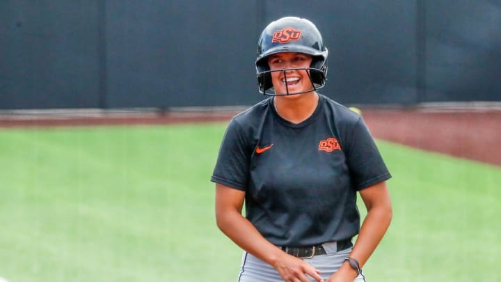 Oklahoma State outfielder Chyenne Factor (9) runs drills during a OSU softball practice in Stillwater, Okla., on Thursday, May 18, 2023.