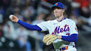 Apr 17, 2025; New York City, New York, USA; New York Mets third baseman Brett Baty (7) throws the ball to first base for an out during the third inning against the St. Louis Cardinals at Citi Field. Mandatory Credit: Vincent Carchietta-Imagn Images