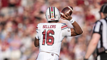 Dec 31, 2024; Orlando, FL, USA; South Carolina Gamecocks quarterback LaNorris Sellers (16) throws the ball against the Illinois Fighting Illini in the first quarter at Camping World Stadium. Mandatory Credit: Jeremy Reper-Imagn Images
