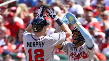 Jul 12, 2025; St. Louis, Missouri, USA;  Atlanta Braves catcher Sean Murphy (12) celebrates with right fielder Ronald Acuna Jr (13) after hitting a go ahead three run home run against the St. Louis Cardinals during the eighth inning at Busch Stadium. Mandatory Credit: Jeff Curry-Imagn Images