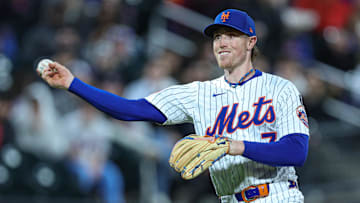Apr 17, 2025; New York City, New York, USA; New York Mets third baseman Brett Baty (7) throws the ball to first base for an out during the third inning against the St. Louis Cardinals at Citi Field. Mandatory Credit: Vincent Carchietta-Imagn Images