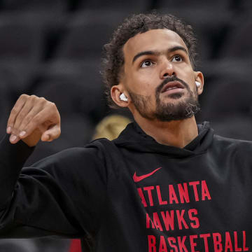 Apr 10, 2024; Atlanta, Georgia, USA; Atlanta Hawks guard Trae Young (11) shown while warming up on the court before the game Charlotte Hornets at State Farm Arena. Mandatory Credit: Dale Zanine-USA TODAY Sports