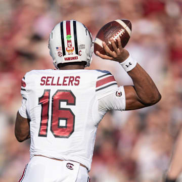 Dec 31, 2024; Orlando, FL, USA; South Carolina Gamecocks quarterback LaNorris Sellers (16) throws the ball against the Illinois Fighting Illini in the first quarter at Camping World Stadium. Mandatory Credit: Jeremy Reper-Imagn Images