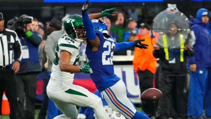 Oct 29, 2023; East Rutherford, New Jersey, USA; New York Giants cornerback Adoree    Jackson (22) is called for interference against New York Jets wide receiver Malik Taylor (86) in overtime at MetLife Stadium.
